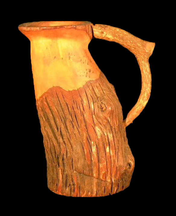 A pitcher made from the trunk of a tree