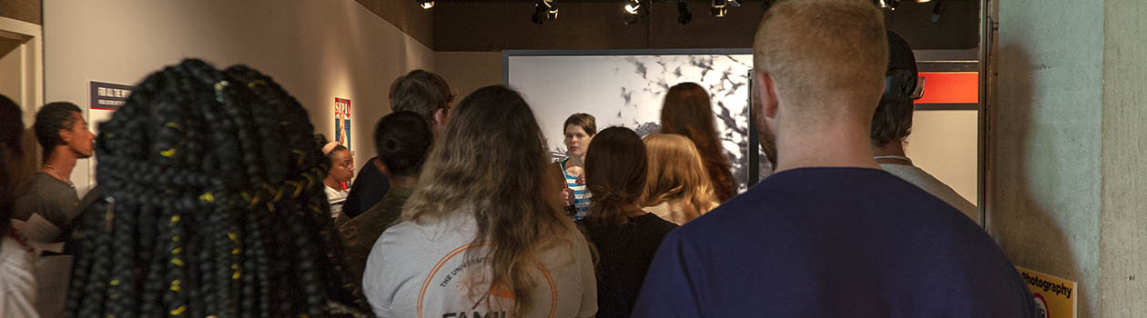 Class visiting a temporary exhibition