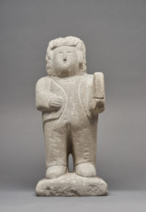 Limestone sculpture of man holding a bible carved by William Edmondson c. 1940